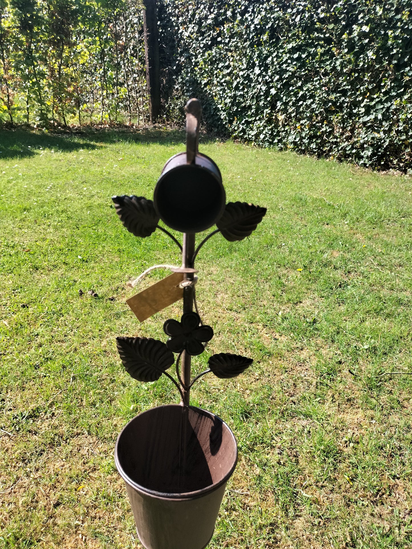 Tuinstekers om bloempotje in te hangen.