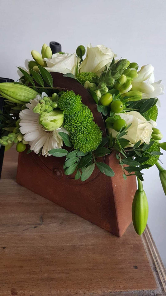 Roestkleurig handtasje met bloemen