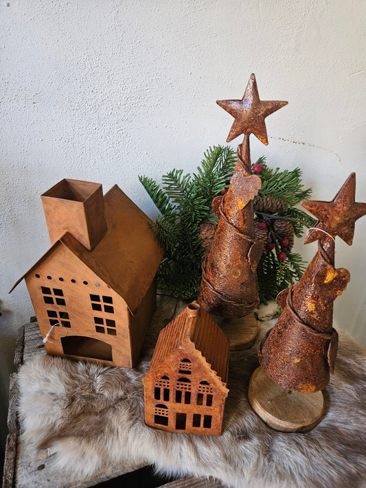 “Roestige Huisjes en Kerstbomen met Karakter”